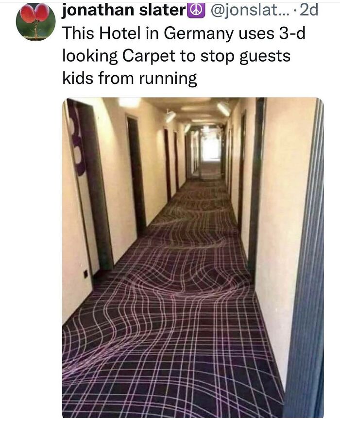 A hotel hallway in Germany featuring a 3D optical illusion carpet to slow down walking
