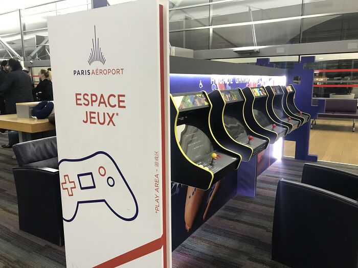 An arcade gaming zone inside Paris airport showing ingenious things in various parts of the world for travelers.