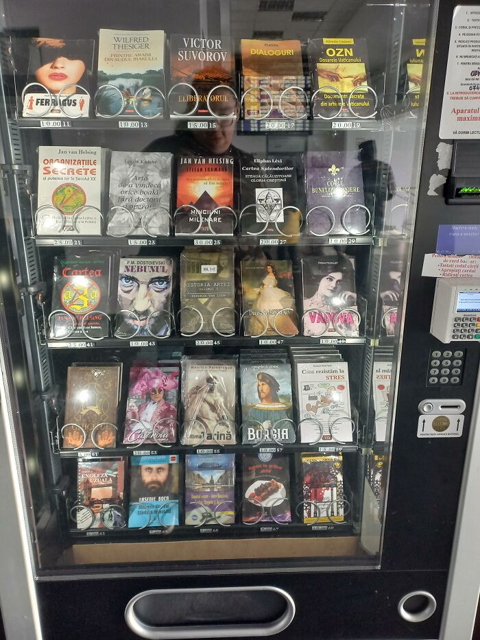 A book vending machine in Romania displaying various titles, showcasing ingenious things around the world.