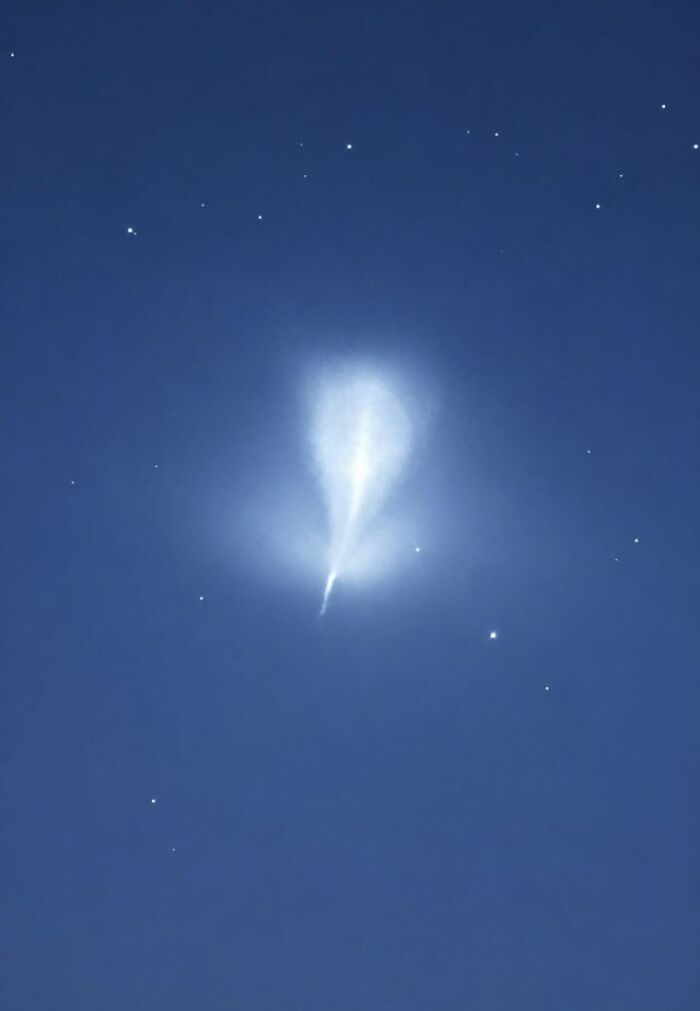Eerie glowing light in the dark night sky, part of creepy photos.