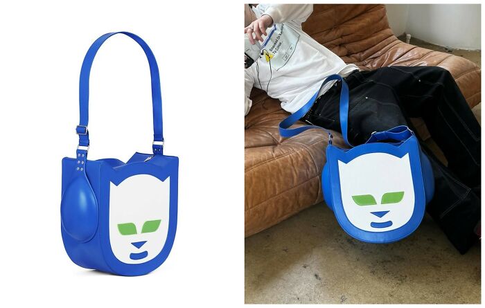 A blue leather handbag shaped like the Napster logo cat reflecting early internet nostalgia