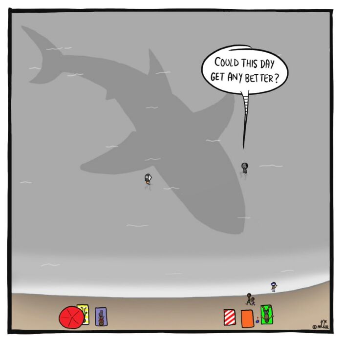 Darkly funny cartoon showing a huge shark shadow beneath two small swimmers at the beach.