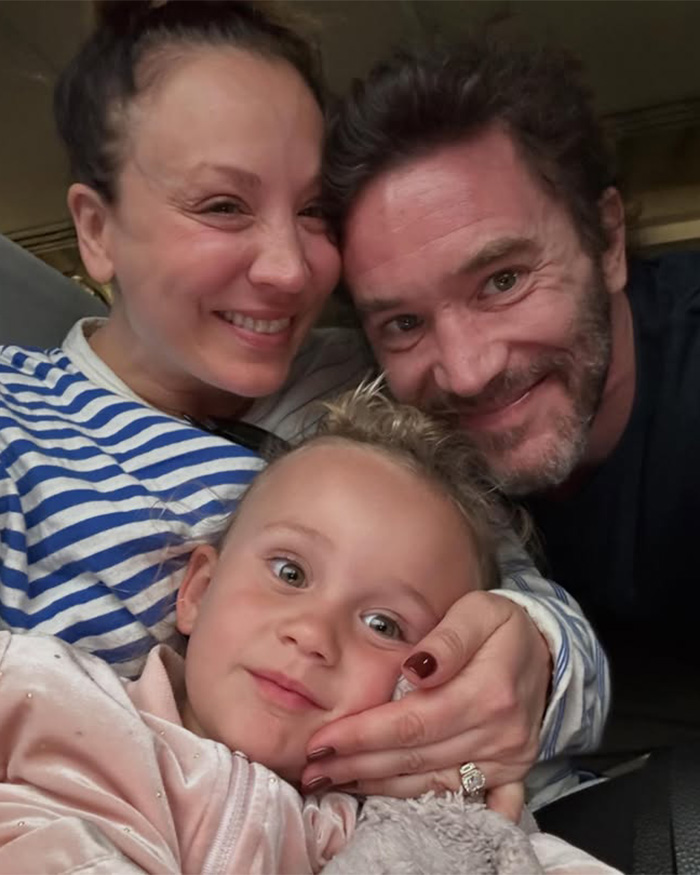 Kaley Cuoco with family posing closely in casual photo Kaley Cuoco with family posing closely in casual photo