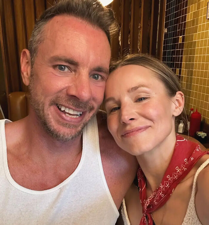 Kristen Bell faces backlash discussion with close-up photo of her and Dax Shepard smiling.