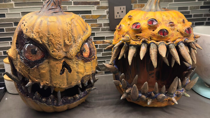 Scary monstrous jack-o-lanterns with sharp teeth and spooky eyes for Halloween decor.