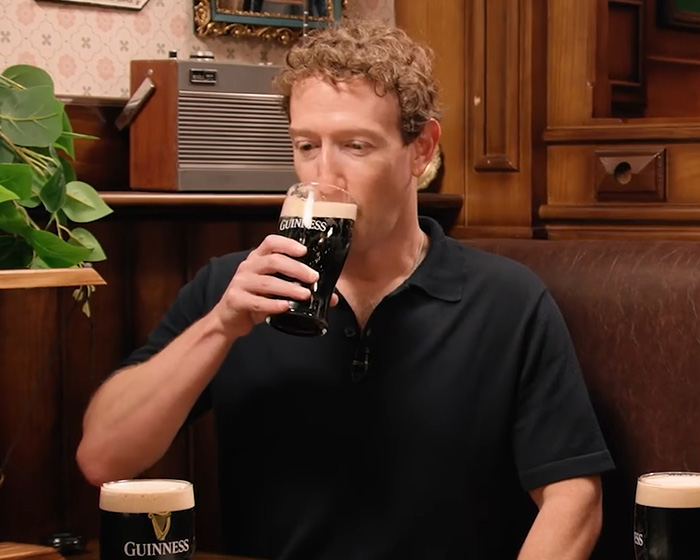 Mark Zuckerberg sipping a glass of Guinness, exhibiting bizarre behavior during an interview. Mark Zuckerberg sipping a glass of Guinness, exhibiting bizarre behavior during an interview.