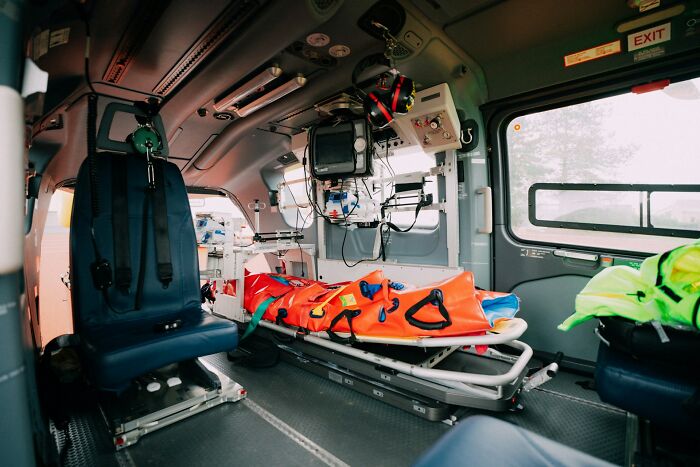 Interior of an ambulance showing a medical stretcher, debunking Hollywood movie rescue stereotypes.