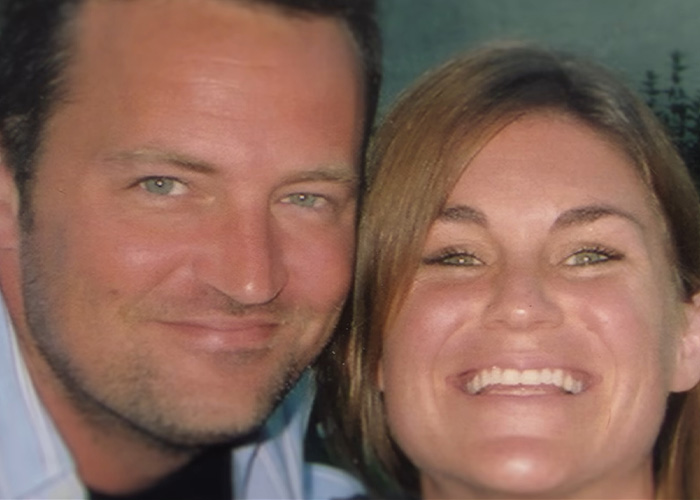 A close-up selfie photo of Matthew Perry smiling happily next to his sister.