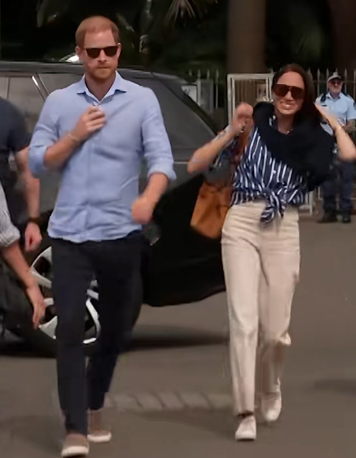 Meghan and Harry walking during Nottingham public appearance Meghan and Harry walking during Nottingham public appearance