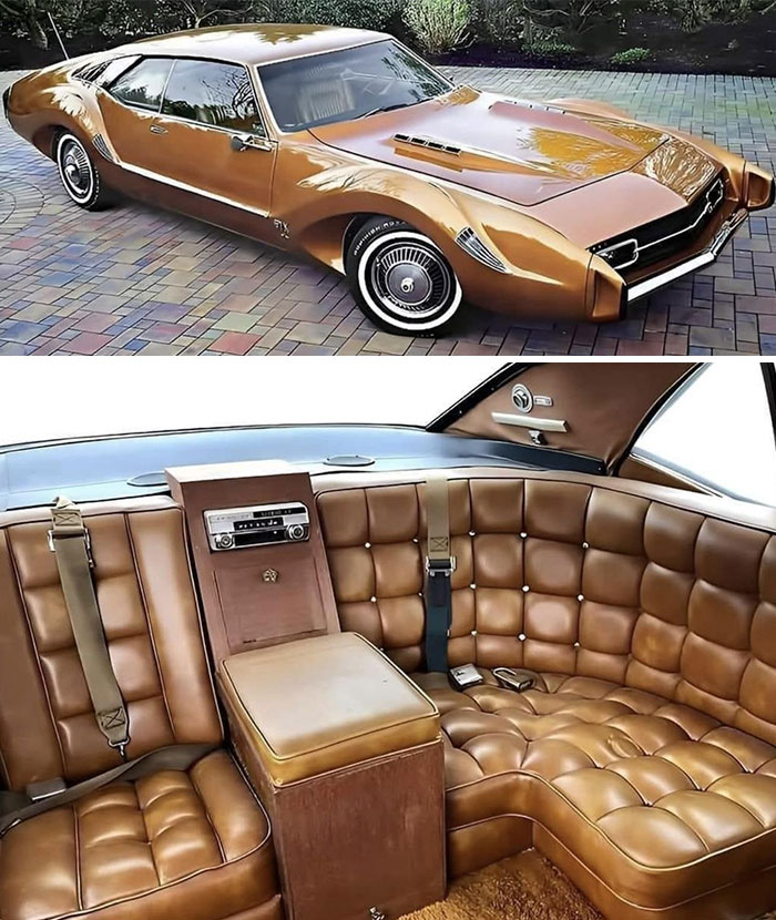 A gold custom classic car from a collection of old photos of America featuring retro plush interior.