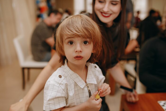 A wide-eyed young boy looking surprised and confused, representing the family being baffled by MIL's behavior. A wide-eyed young boy looking surprised and confused, representing the family being baffled by MIL's behavior.