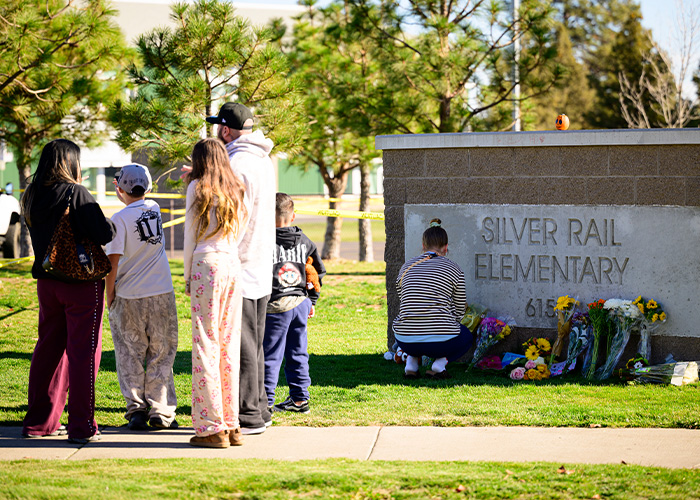 People mourn outside Silver Rail Elementary after Oregon elementary school tragedy
