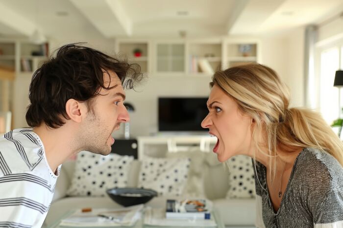 Angry married couple yelling during an argument before divorce