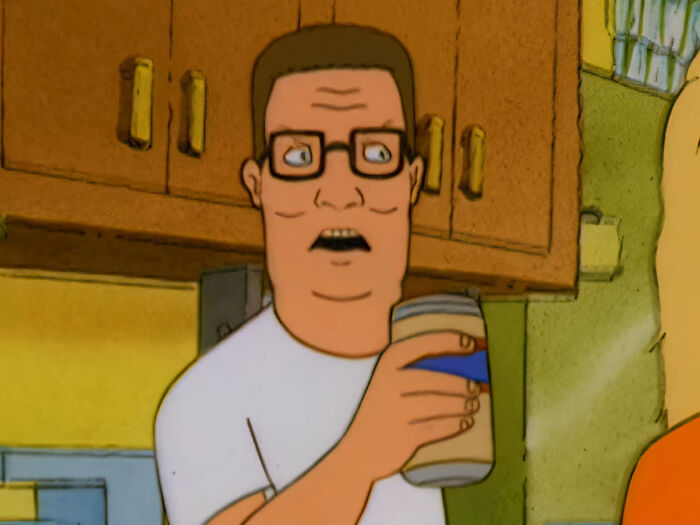 Hank Hill looking shocked while holding a can, a reaction matching intelligent insults