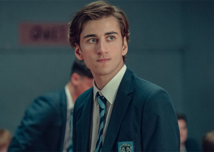 Hollywood star Sebastian Croft in a school uniform looking to the side.