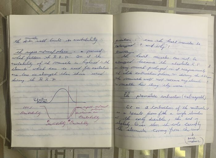 An open notebook displaying handwritten notes, an example of lost and found paper.