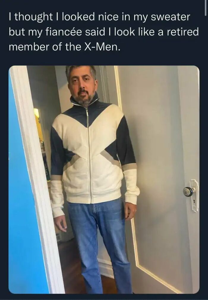 A man wearing a sweater resembling an X-Men uniform, showcasing funny insults.
