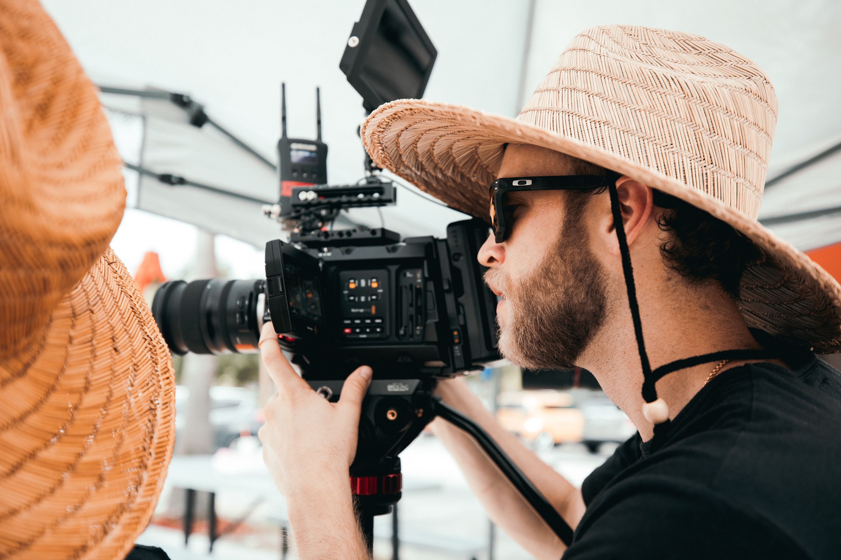Cameraman operating a video camera to record footage related to a controversial PS2 game. Cameraman operating a video camera to record footage related to a controversial PS2 game.