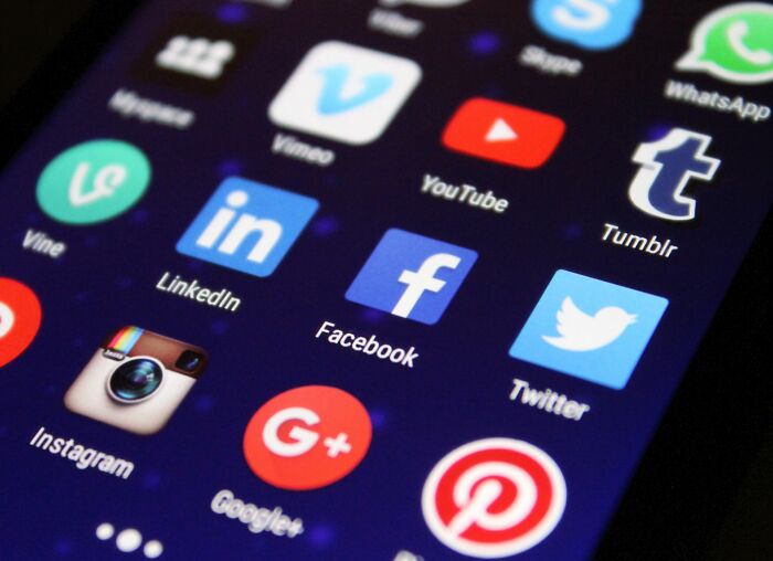 Smartphone screen showing social media apps related to hilarious ways to get back at an ex