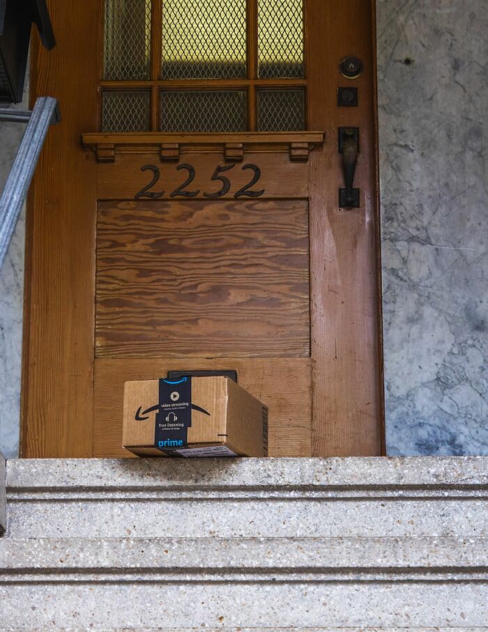 An Amazon package delivered to a front door showcasing clever life tricks