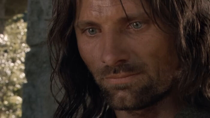 Close up of Aragorn showing emotion, an example of positive masculinity.
