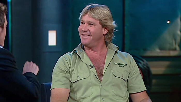 Steve Irwin smiling during an interview, showcasing compassion and positive masculinity