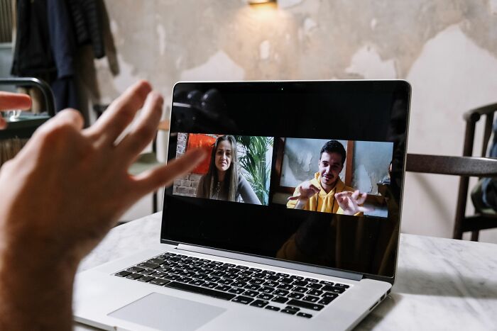 A person having an online video call before someone got fired in their first week