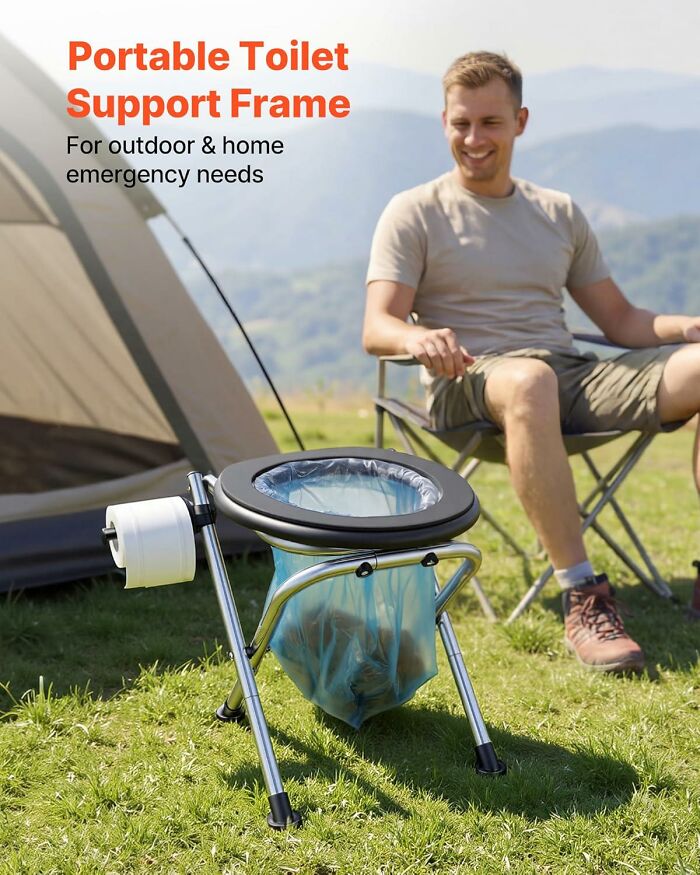 A man camping near a portable toilet support frame with a clear bag, showing an awkward advertising fail.