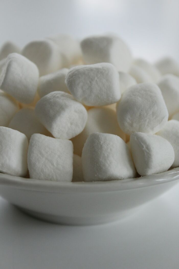 Close-up of mini marshmallows in a white bowl