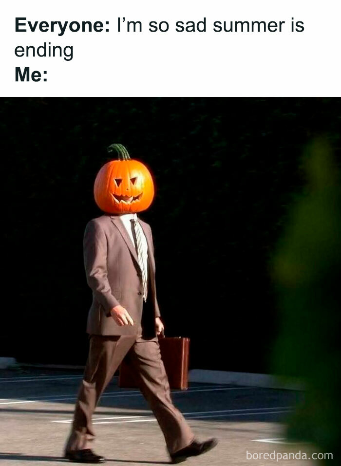 Spooky season meme featuring Dwight Schrute walking with a pumpkin head in a suit