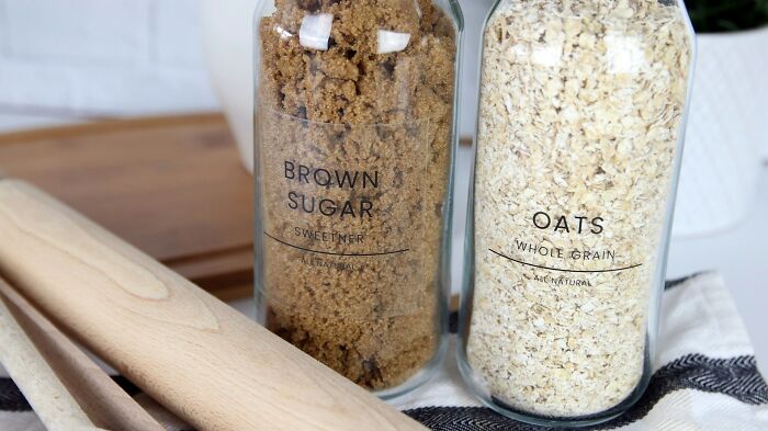Glass jars with brown sugar and oats for kitchen storage hacks