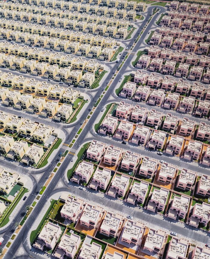 Aerial view of a sprawling residential development of buildings and spaces, from The Perspa Awards 2026.