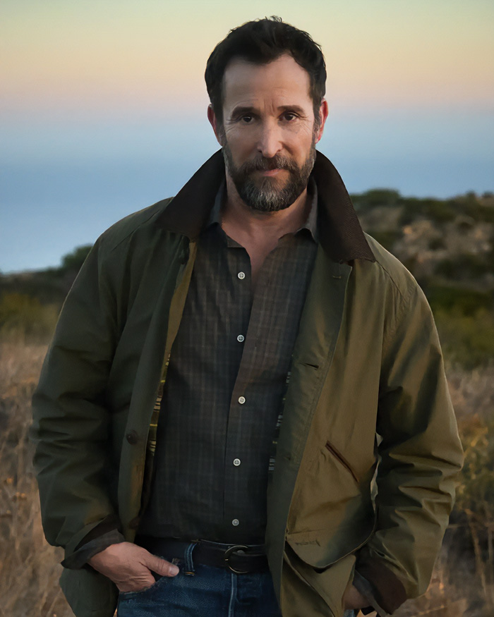 The Pitt star Noah Wyle posing outdoors in a green jacket The Pitt star Noah Wyle posing outdoors in a green jacket