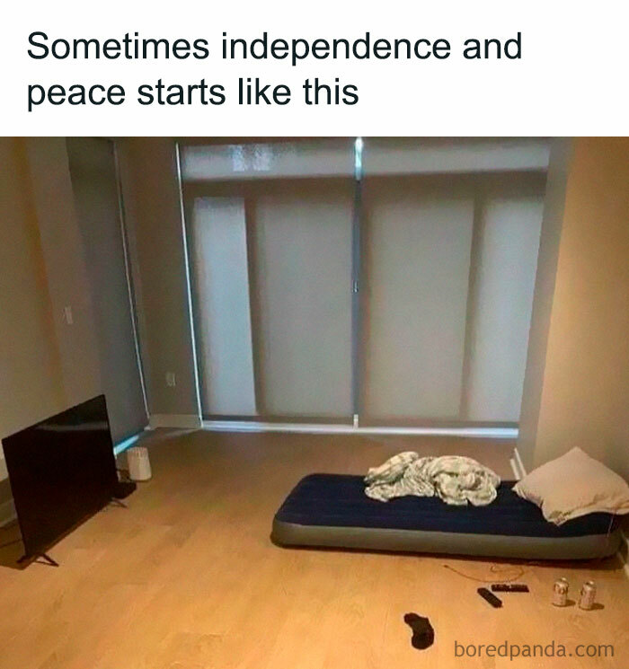 An empty room with just a TV and air mattress, fitting memes for introverts enjoying peace.