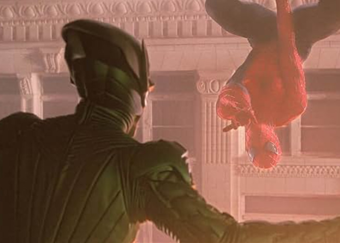 A movie scene showing Tobey Maguire as Spider-Man hanging upside down in front of Green Goblin A movie scene showing Tobey Maguire as Spider-Man hanging upside down in front of Green Goblin