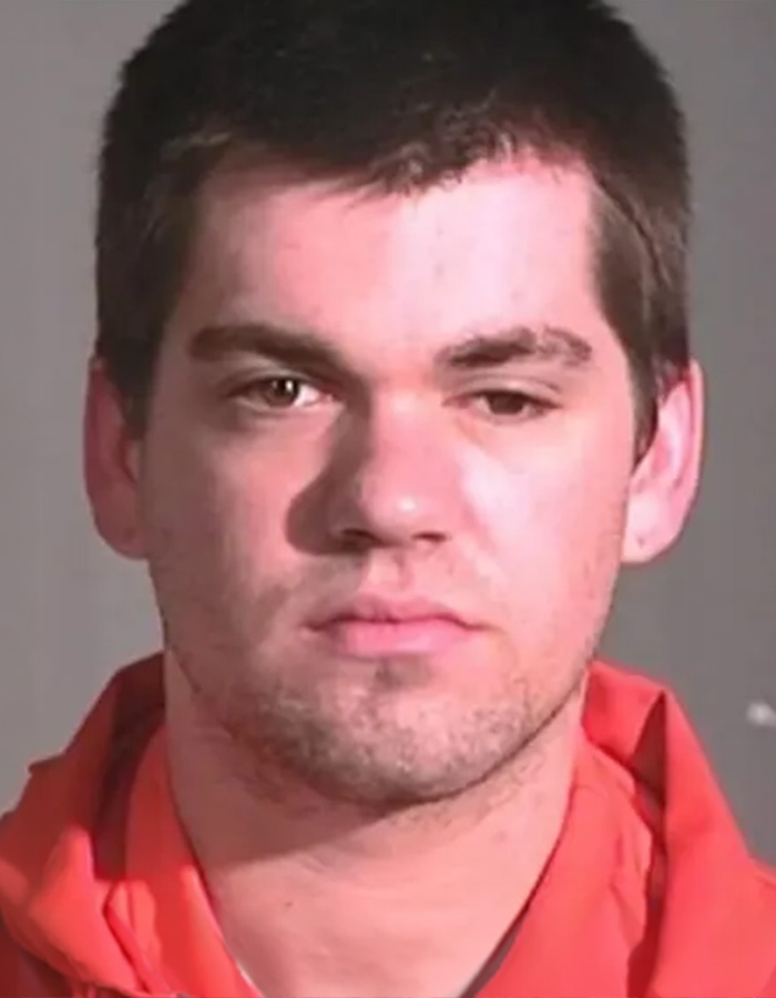 A mugshot of a young man involved in true crime stories