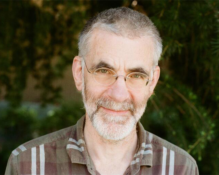 Portrait of the UC Berkeley professor who refused to grade student homework due to a troubling trend.