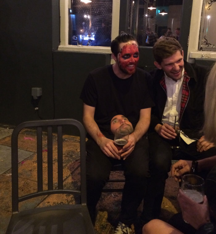 Man wearing a custom face mask made with a 3D printer at a pub