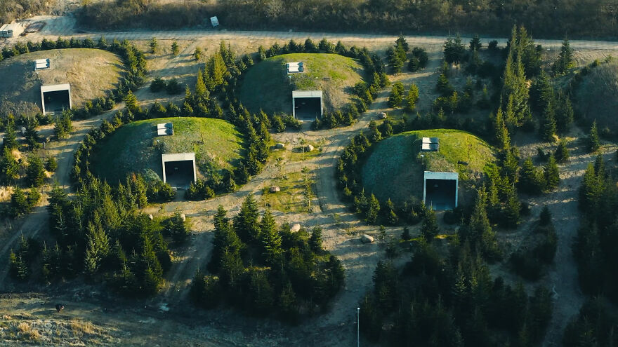 Aerial view of sensory deprivation pods amid trees Aerial view of sensory deprivation pods amid trees