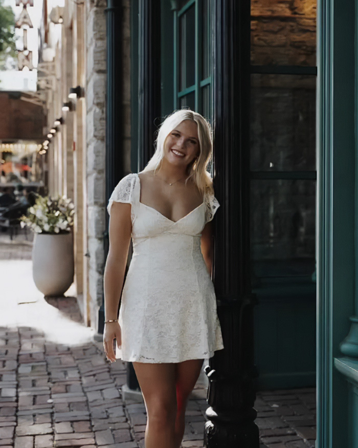 Blonde student posing outdoors, involved in a video telling a protester to go back to your country. Blonde student posing outdoors, involved in a video telling a protester to go back to your country.