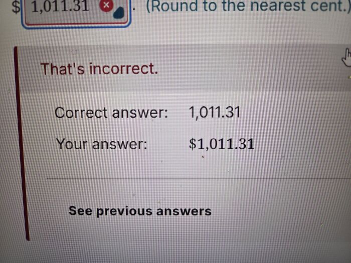 An online test marking a correct numerical answer incorrect due to a dollar sign, showing absurd moments.