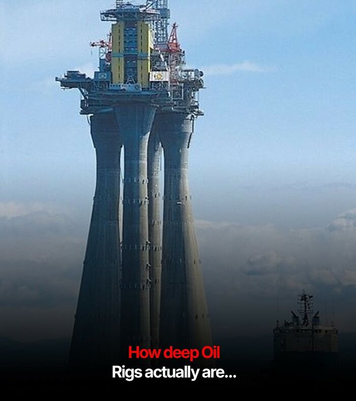 Massive oil rig structure standing tall in sea water, showcasing cursed images vibes