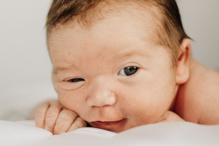 Close up of a newborn baby highlighting human body facts