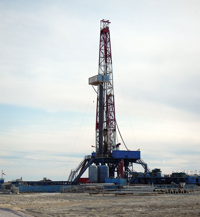 Oil rig drilling equipment at industrial job site