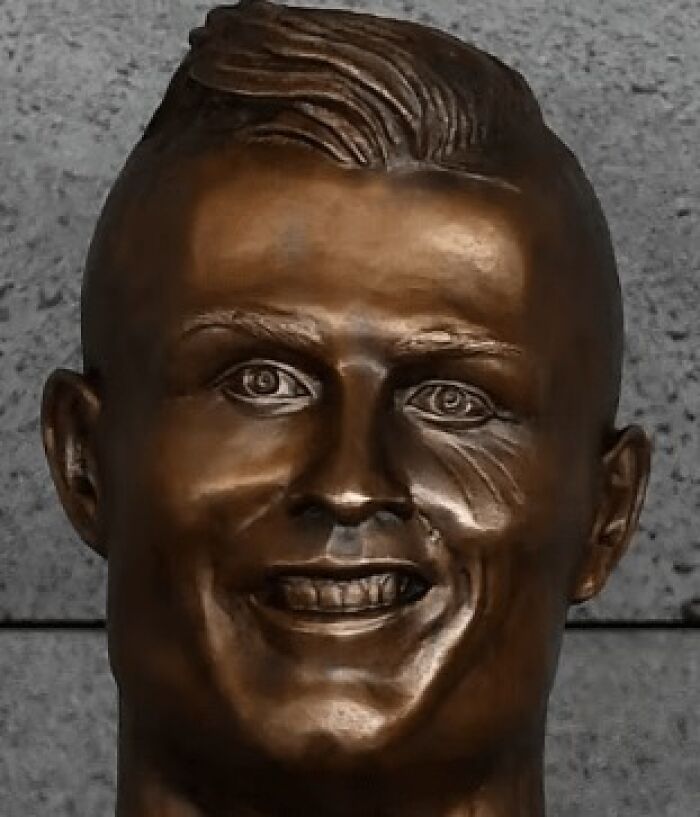Close up of the infamous and bizarre Cristiano Ronaldo bronze bust, a funny example of public art