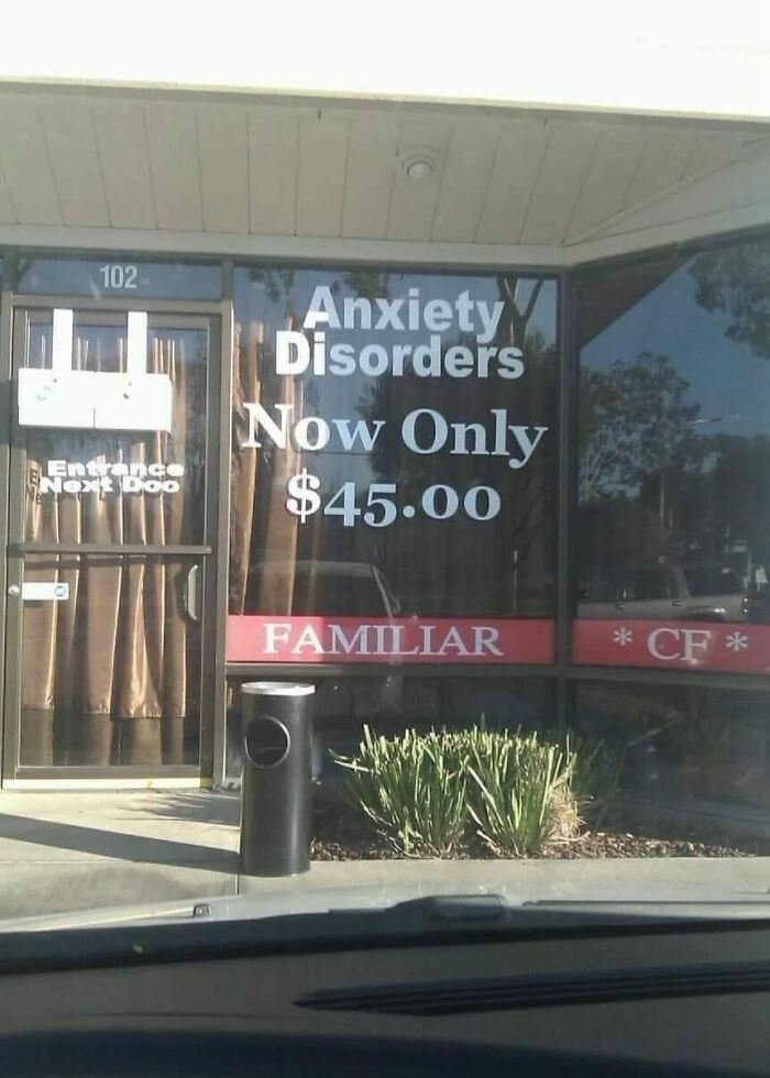 Storefront window reading Anxiety Disorders Now Only $45.00, an ironic advertising fail.