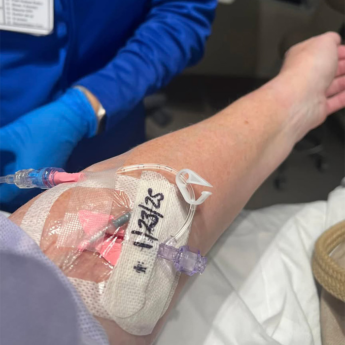 Patient receiving intravenous treatment for cancer