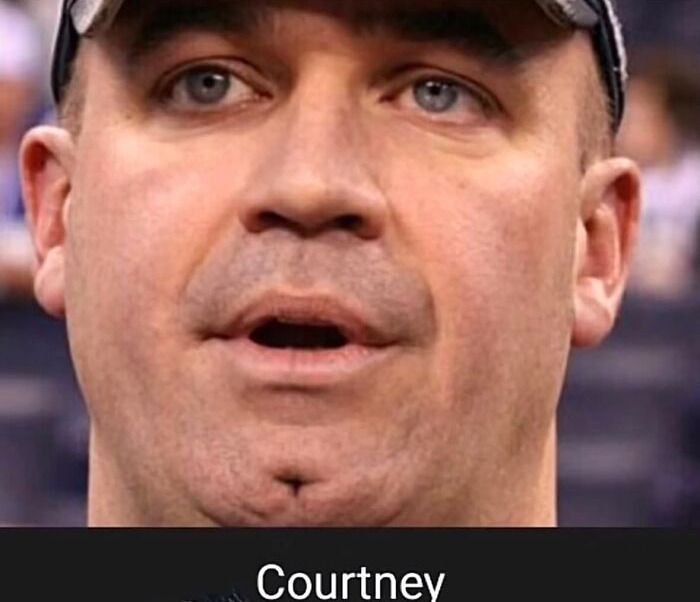 Close-up of man with cap and surprised expression