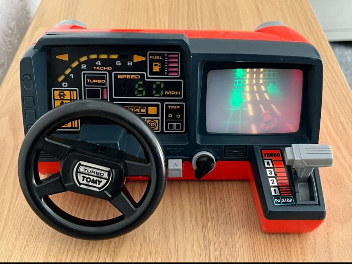 A classic vintage Tomy Turbo steering wheel handheld game, one of the nostalgic photos of 80s kids toys.
