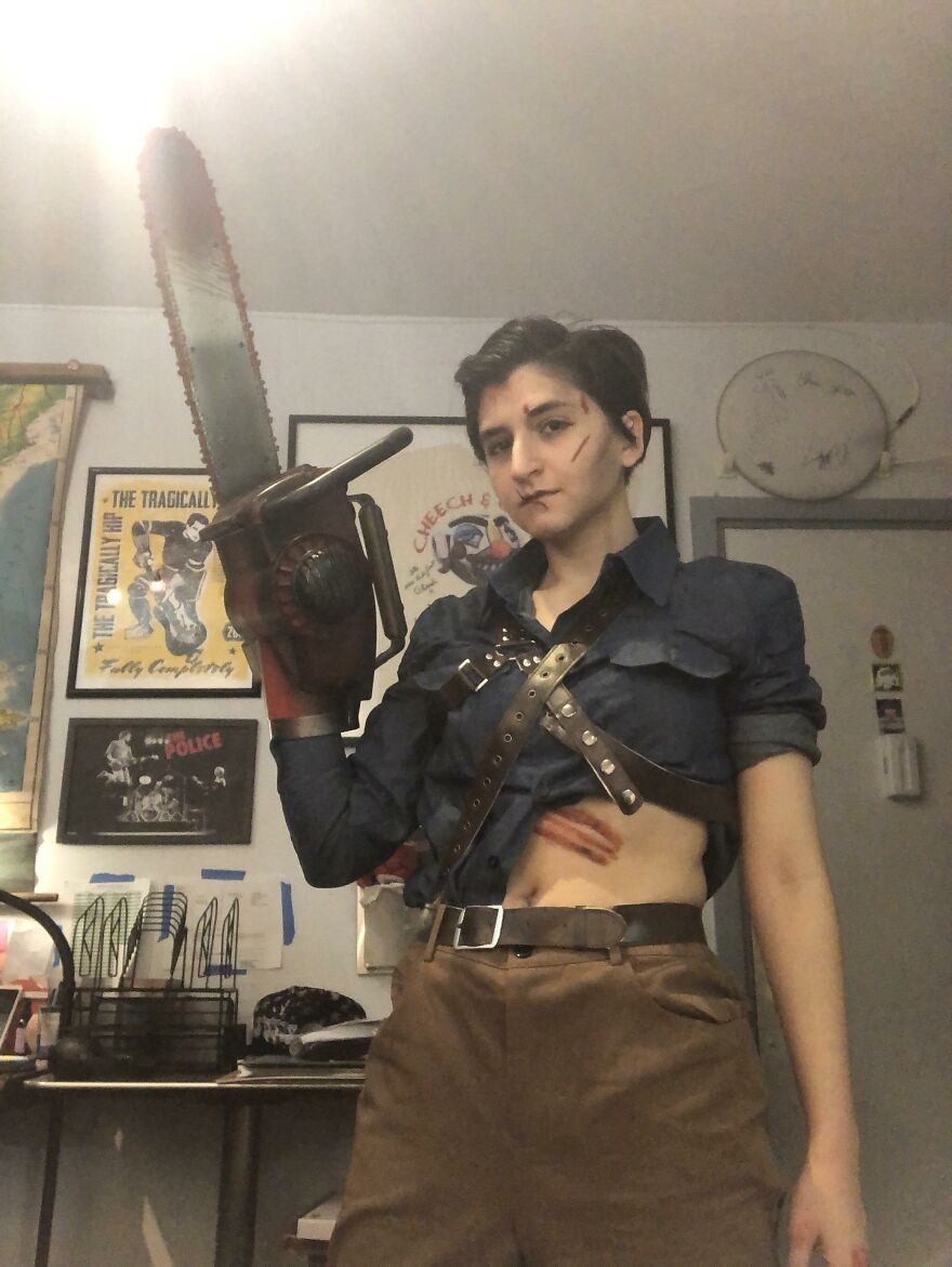 Person dressed as Ash Williams with chainsaw arm for creative Halloween costume idea